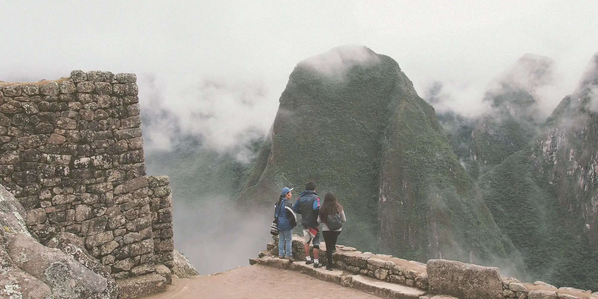 Machu Picchu terraces wrapped in cloud forest