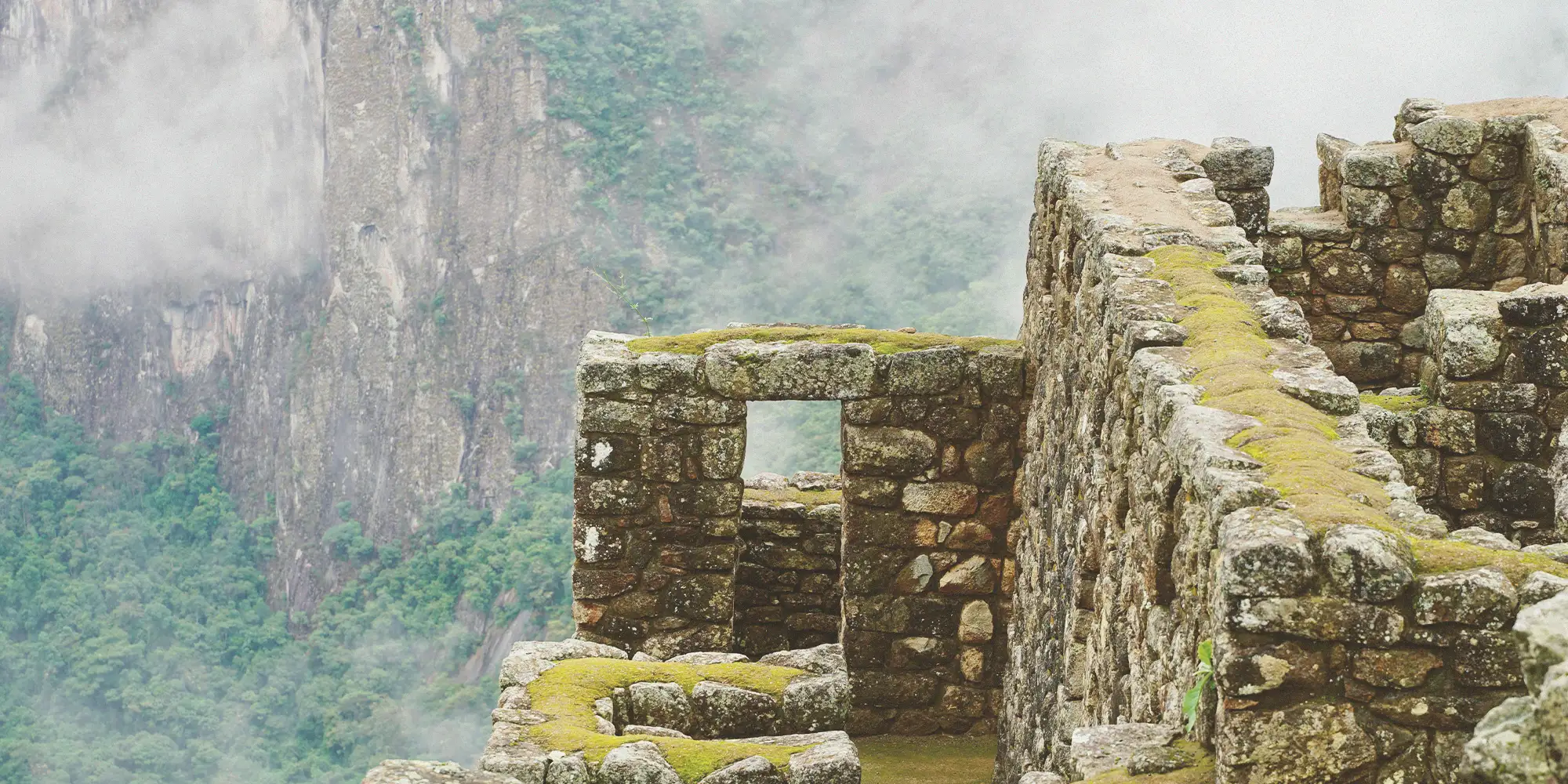 Traveler looking over the Machu Picchu citadel