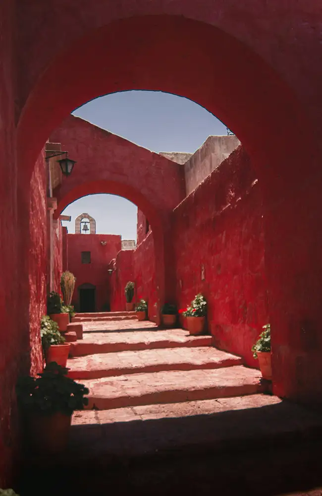 Stone arch framing the Misti volcano in Arequipa