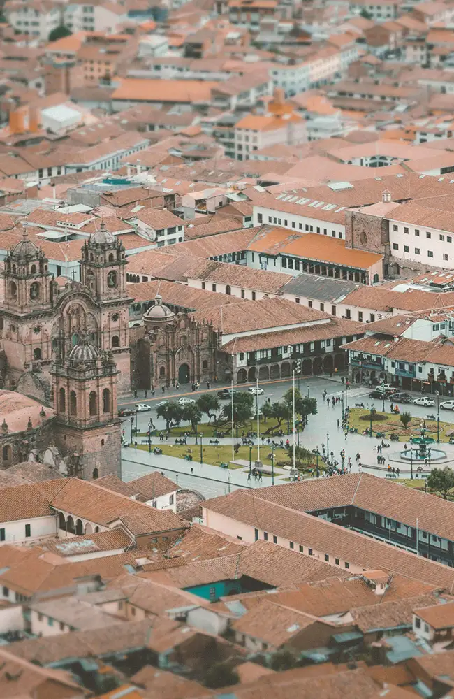 Cusco cathedral under a dramatic sky